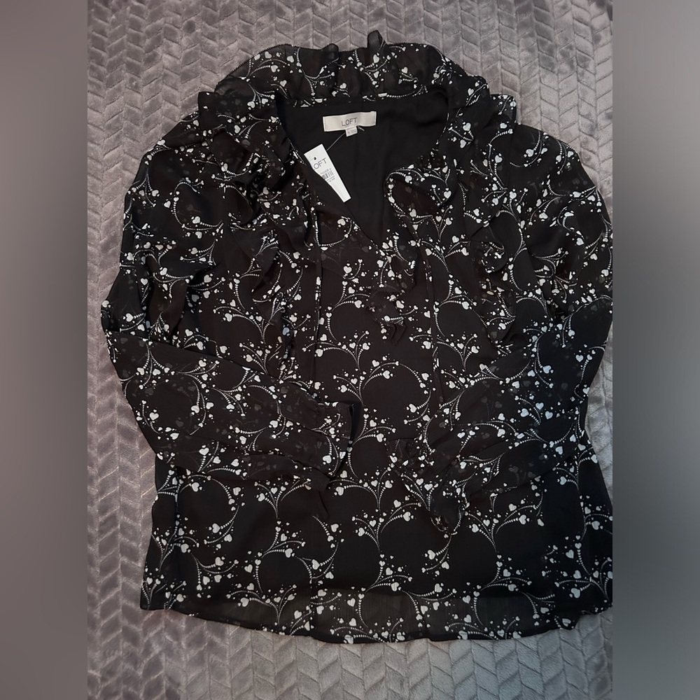 Black blouse with white pattern